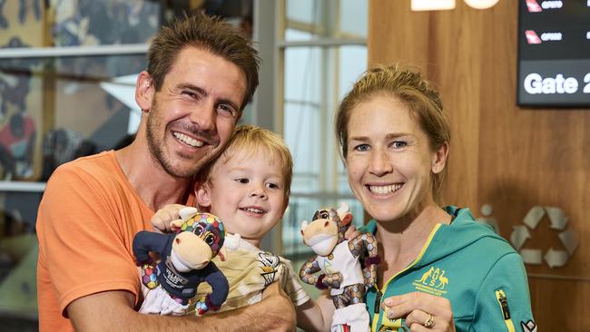 Dylan Stenson, Billy Stenson, 2, and Jess Stenson with her gold medal. Picture: Matt Loxton