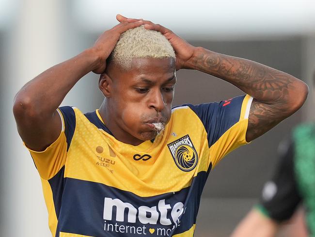 MELBOURNE, AUSTRALIA - APRIL 13: Angel Torres of the Mariners reacts after missing a goal during the A-League Men round 24 match between Western United and Central Coast Mariners at Regional Football Facility, on April 13, 2024, in Melbourne, Australia. (Photo by Daniel Pockett/Getty Images)