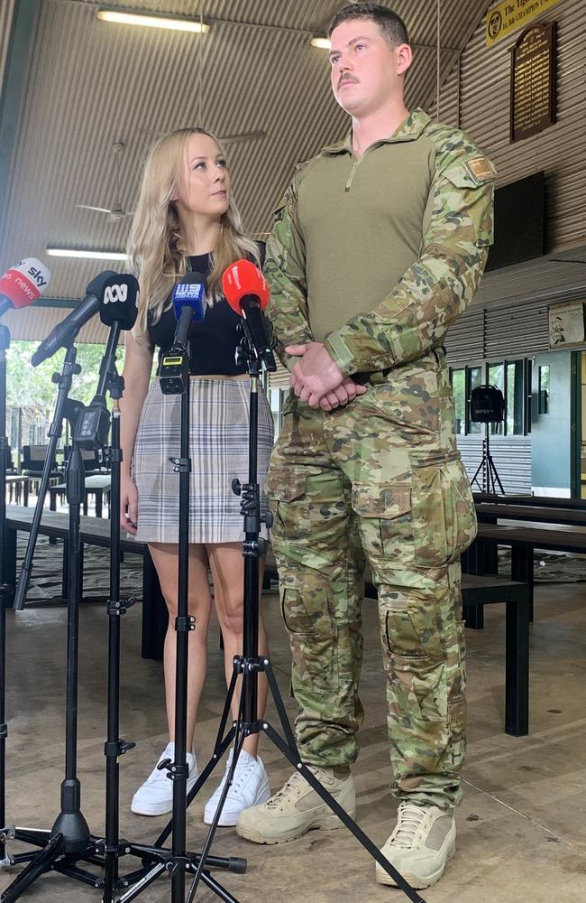 The first contingent of Darwin’s 1st Brigade soldiers will deploy to the UK in January. A deploying soldier (pictured alongside his partner) said learning Ukrainian language was part of the group’s training. Picture: Sierra Haigh