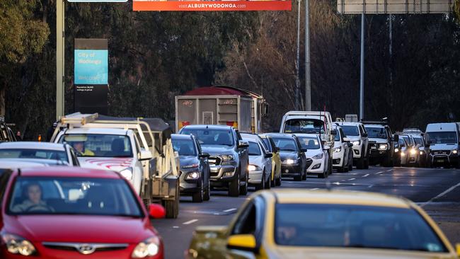 Cars wait in line in Albury. Picture: Getty