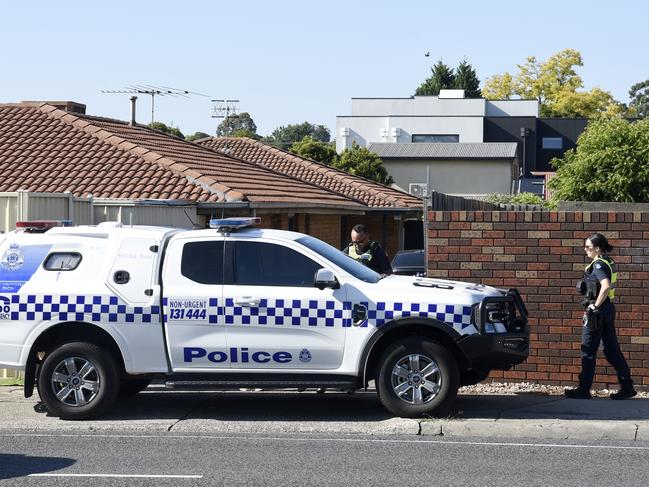 Police guard a property at 78 Ormond Rd Ascot Vale after a woman was found dead yesterday afternoon. Picture: Andrew Henshaw