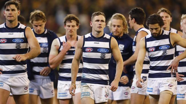 Joel Selwood leads his teammates off after Geelong’s qualifying final loss. Picture: Michael Klein