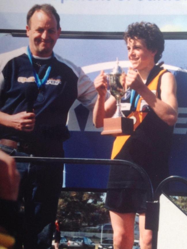 Port Adelaide player Travis Boak pictured as a junior with his dad Roger, who had just coached the Torquay U14s to a premiership with Trav as captain and best on ground. Picture: Supplied by Boak family