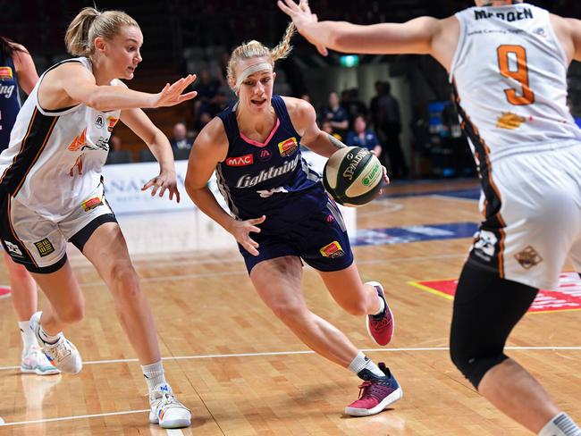 Adelaide's Nicole Seekamp takes on Townsville's Darcee Garbin. Picture: TOM HUNTLEY