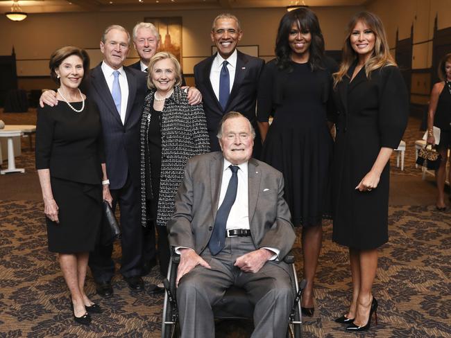 George H.W. Bush (centre) with (l-r) Laura and George W Bush, Bill and Hillary Clinton, Barack and Michelle Obama and Melania Trump in a group photo at the funeral service for first lady Barbara Bush. Picture: Paul Morse/Courtesy of Office of George H.W. Bush via AP