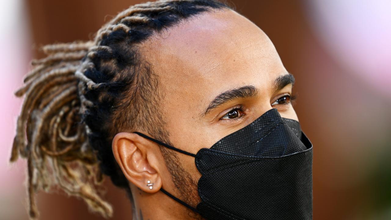 Lewis Hamilton said his right earring is welded on. (Photo by Clive Mason/Getty Images)