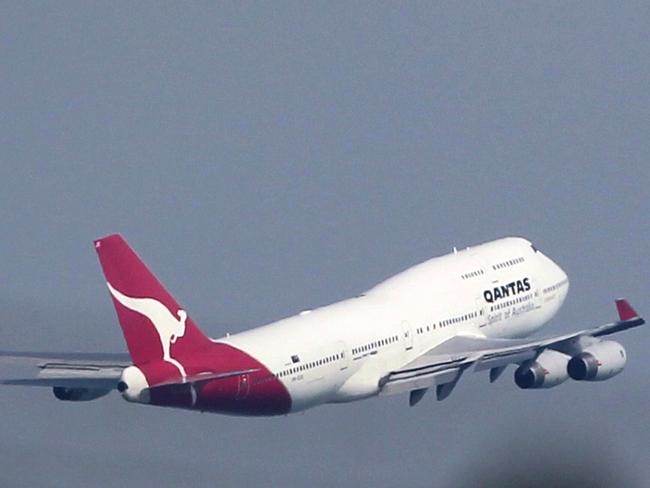 A Qantas plane carrying passengers stranded by the Qantas QF-6 Boeing 747-400 passenger plane takes off from the Changi International Airport on Saturday Nov. 6, 2010. A Qantas Boeing 747 with 431 people on board landed safely in Singapore late Friday after reporting an engine problem shortly after takeoff, the airline said. The problem arose just a day after a Qantas Airbus A380 superjumbo jet made an emergency landing at the same airport due to an engine blowout.(AP Photo/Wong Maye-E)
