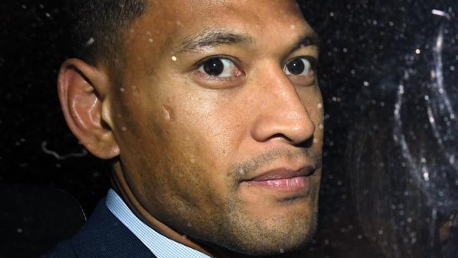 Wallabies star Israel Folau leaves a Code of Conduct hearing in Sydney, Tuesday, May 7, 2019. Folau appeared before a code of conduct hearing to fight Rugby Australia's decision to terminate his contract after he posted in mid-April on social media that gay people, along with other 'sinners' will face damnation unless they repent. (AAP Image/Joel Carrett) NO ARCHIVING