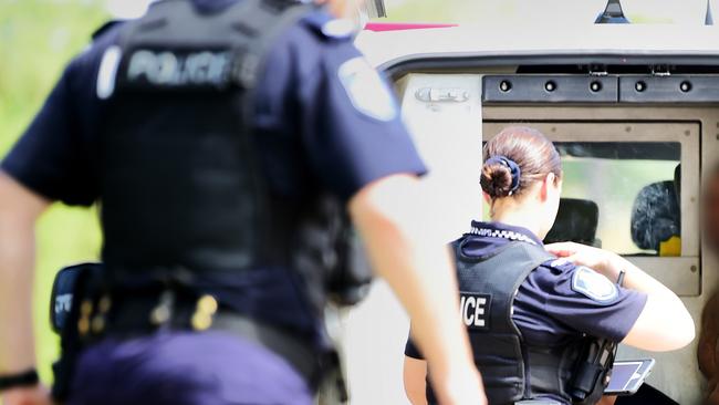 Police arrest a man in relation to an alleged stolen vehicle. A Toyota LandCruiser was dumped near Lappin Park, Kirwan.  Picture: Alix Sweeney