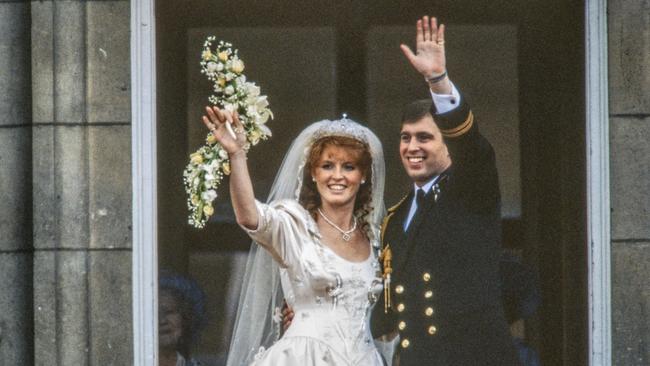 View of just-married couple Sarah, Duchess of York, and Prince Andrew, Duke of York, as they wave from the balcony of Buckingham Palace, London, England, July 23, 1986. Picture: Getty Images.