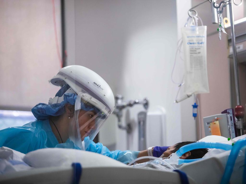 Registered nurse Yeni Sandoval wears personal protective equipment (PPE) while she cares for a COVID-19 patient in the Intensive Care Unit in California. Picture: AFP