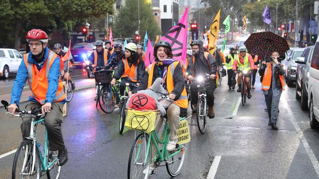 The rain didn’t deter the protesters. Picture: David Crosling