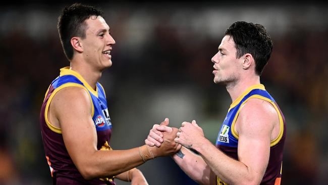 Brisbane legend Simon Black wants to see more of Hugh McCluggage (left) and Lachie Neale (right) together in midfield. Photo: Quinn Rooney / Getty Images