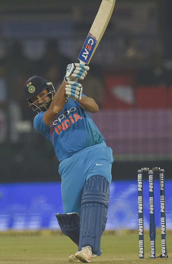Rohit Sharma hits out during his century.