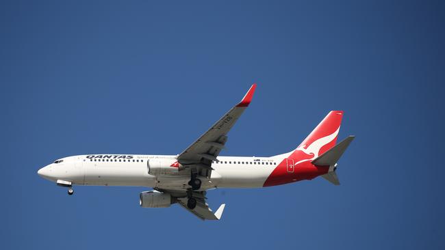 General, generic, stock photo of a Qantas passenger jet airplane coming in to land at the Cairns Airport, bringing domestic tourists into the Far North Queensland region. PICTURE: BRENDAN RADKE