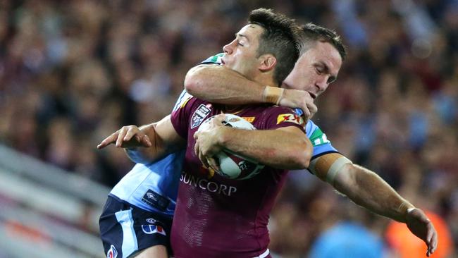 Cooper Cronk of QLD rattled by James Maloney of NSW during the 2nd State of Origin game in 2016. Picture: Darren England
