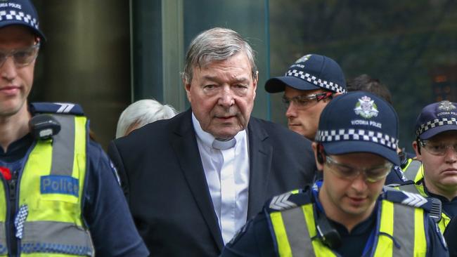 Cardinal George Pell, the most senior Catholic cleric to face sex charges, leaves court in Melbourne. Picture: AP Photo/Asanka Brendon Ratnayake