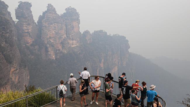 Tourists at Echo Point lookout in Katoomba on December 9. Picture: AAP Image/Carmela Roche