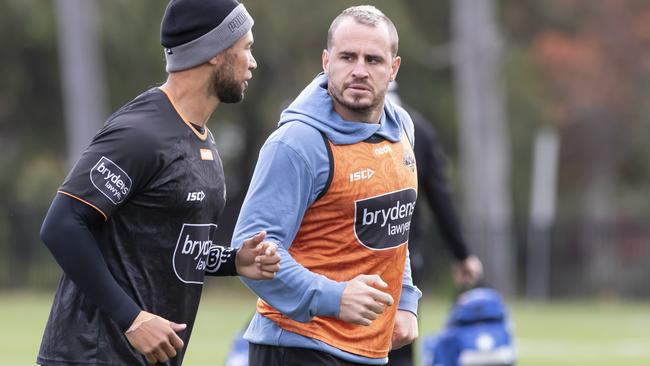 Wests Tigers utility Josh Reynolds, right, is confident a third drug test taken after he was pulled over by police late on Sunday night will confirm the negative reading of his second test. Picture: AAP