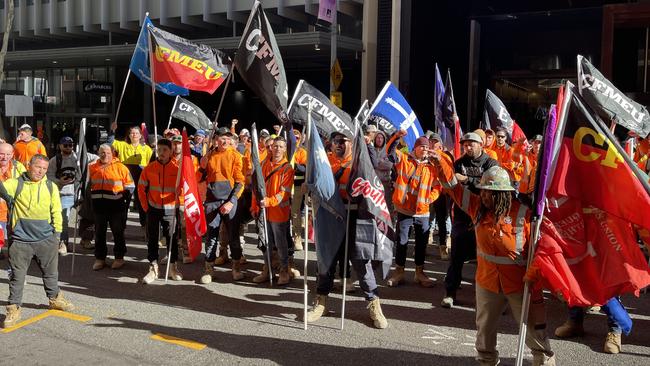 CFMEU members outside 155 Charlotte St, following a march through the CBD. Picture: Steve Pohlner