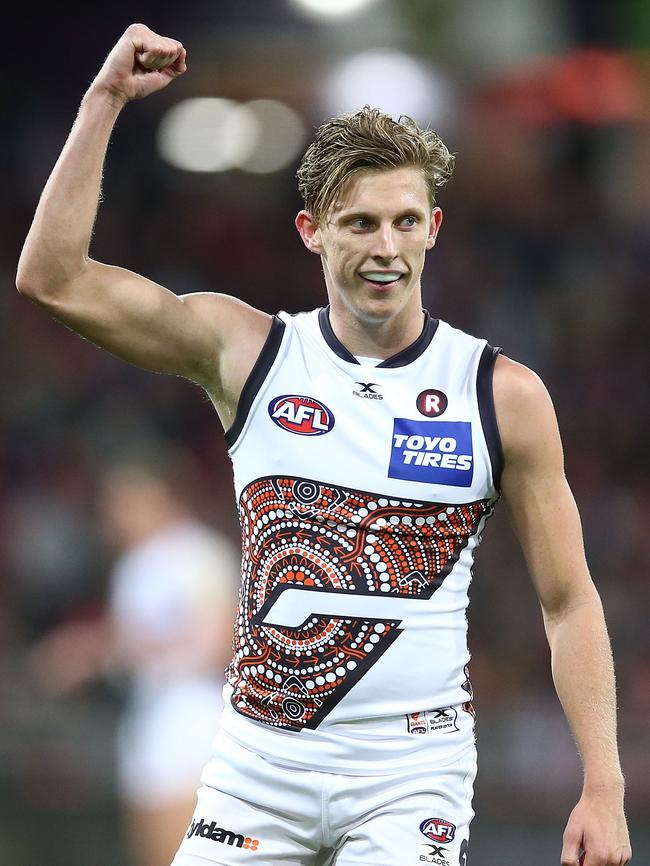 Lachie Whitfield celebrates a Giants’ goal.