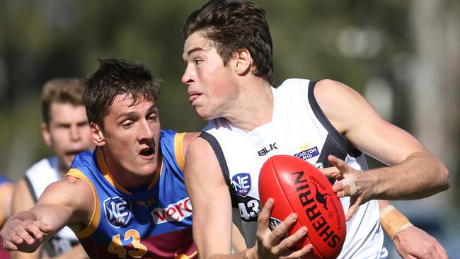 Daniel Charlesworth of Southport and Josh McGuinness of Brisbane Lions during the Round 17 NEAFL game played at the Wally Fankhauser Reserve, Southport, Gold Coast. Photo: Regi Varghese