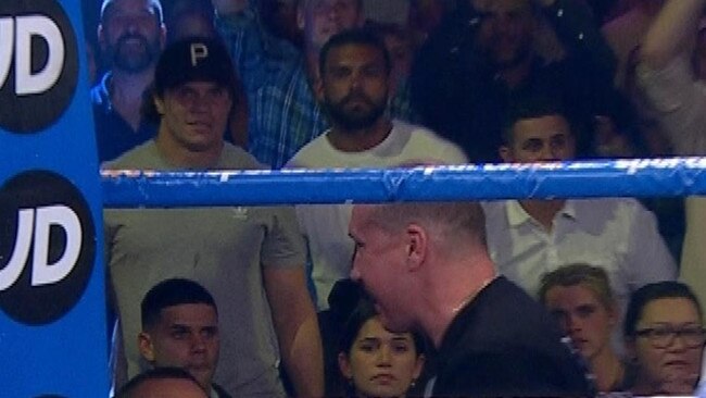 James Roberts (cap) was spotted at the fight without a mask.