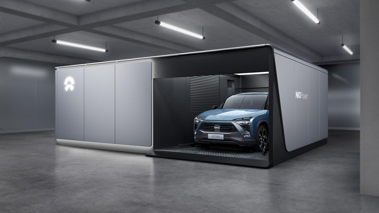 Nio’s Battery swap stations have a drive-in element on one side, next to spare batteries.