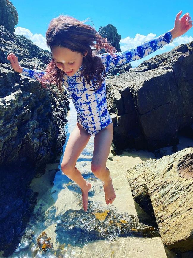 Exploring rock pools at Burgess Beach.