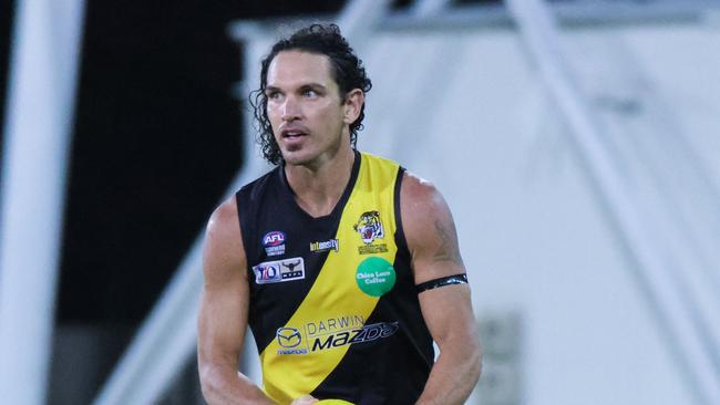 Cam Ilett with ball in hand for Nightcliff Tigers in the 2022-23 NTFL season. Picture: Celina Whan / AFLNT Media