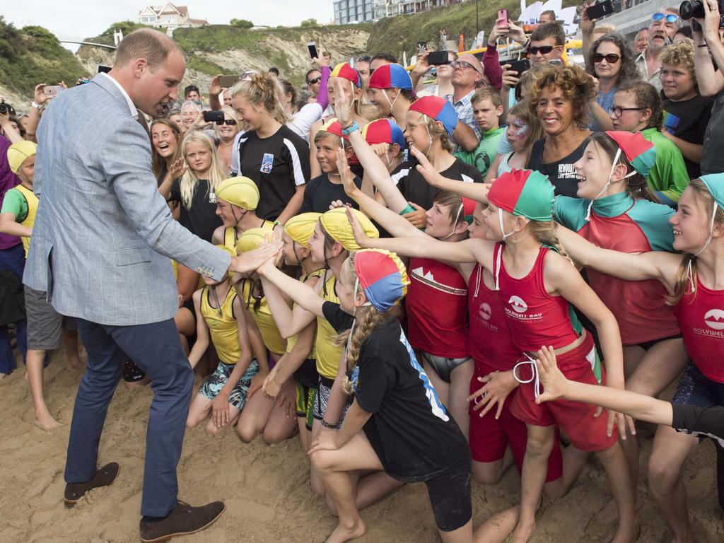 Prince William, Duke of Cambridge greets children as he visits the work of the Wave Project on Newquay’s Towan Beach, an organisation that uses surfing as a tool to reduce anxiety in children and improve their mental wellbeing on September 1, 2016 in Newquay, United Kingdom. Picture: Getty