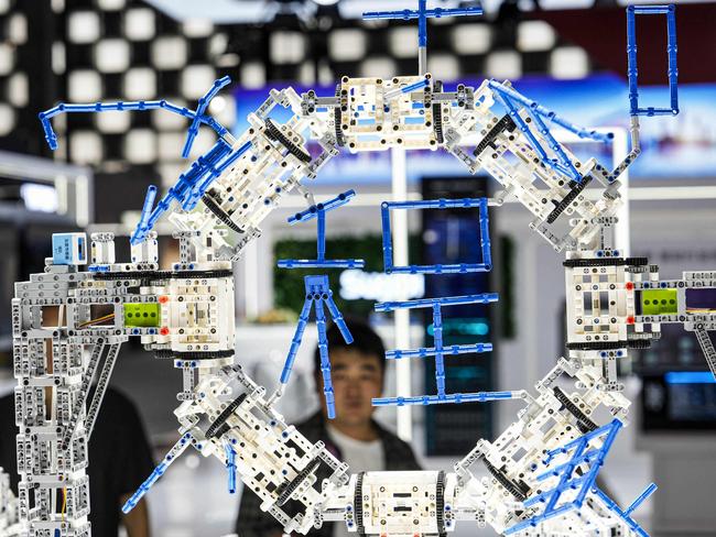 People visit the World Artificial Intelligence Conference (WAIC) in Shanghai on July 4, 2024. (Photo by AFP) / China OUT