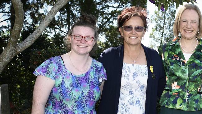 09/06/2023 - Gymnast Georgia Nugent (left) with coach Natalie Upshall (centre) and Governor of Queensland Dr Jeannette Young at a recent function to celebrate the Special Olympians at Government House. Picture: supplied