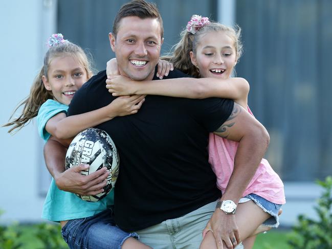 Former NRL star Scott Prince enjoys time with his two girls Taliah 10 and Kahlen 8 at his Carrara home before the launch of the National Dads and Daughters day. Pics Adam Head