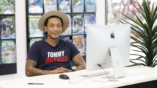 Paradise Adventure Travel owner Joseph Kim will sell tours along the east coast, as well as original artworks from his store. Picture: Brendan Radke