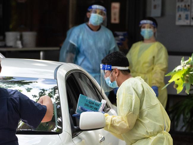 Healthcare workers administering COVID-19 tests at a drive-through testing centre in Leichhardt. Picture: NCA NewsWire / James Gourley