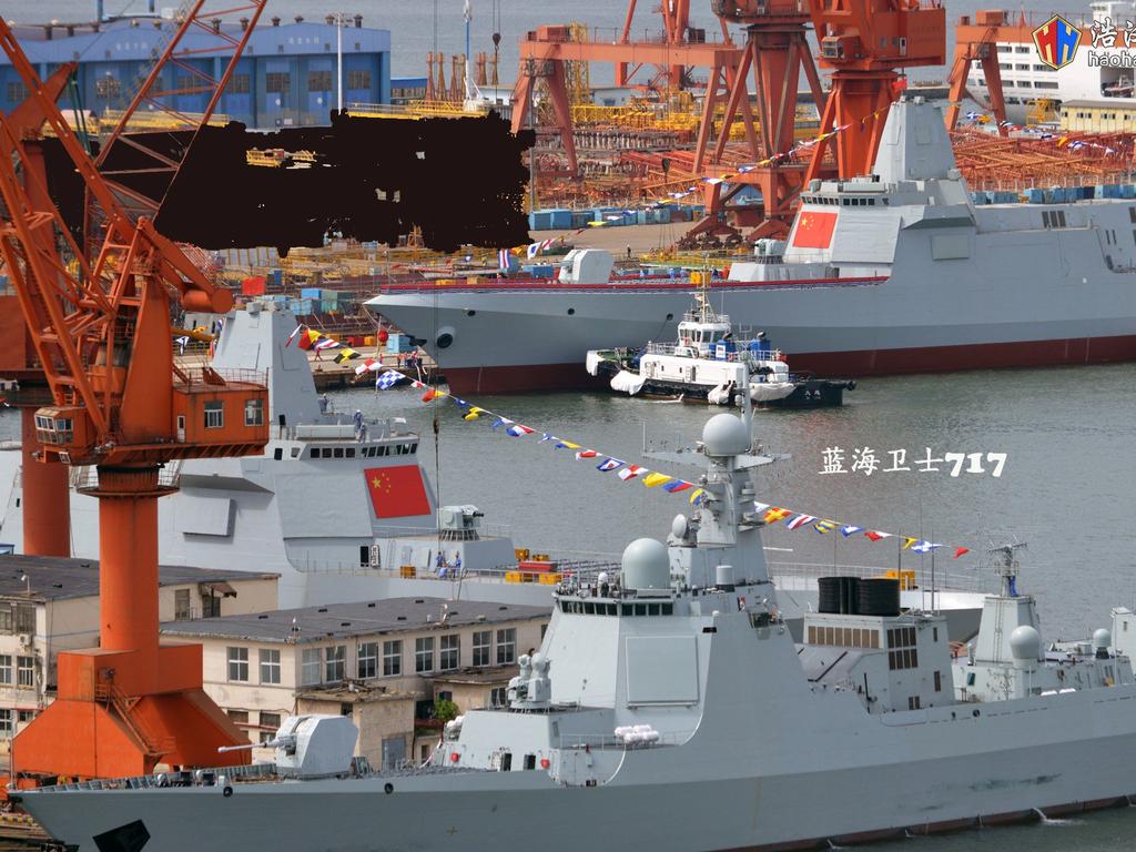 The two new Type 055 destroyers China says will be armed with next-generation electromagnetic rail guns.