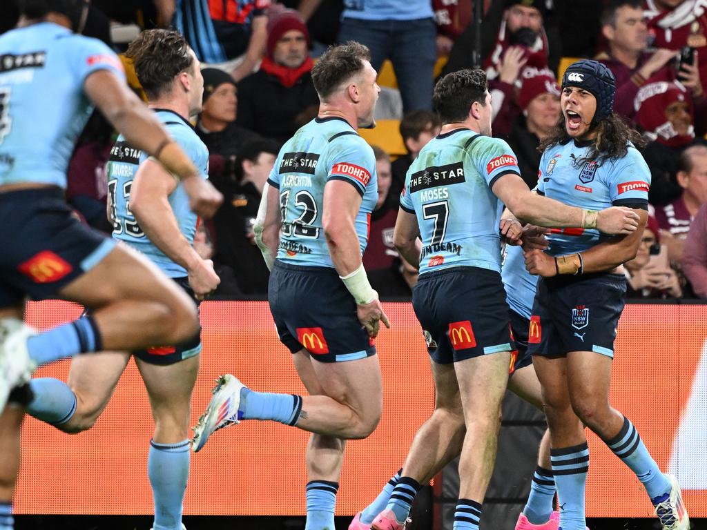 Jarome Luai and the Blues celebrate a try to Bradman Best. Picture: Bradley Kanaris/Getty Images