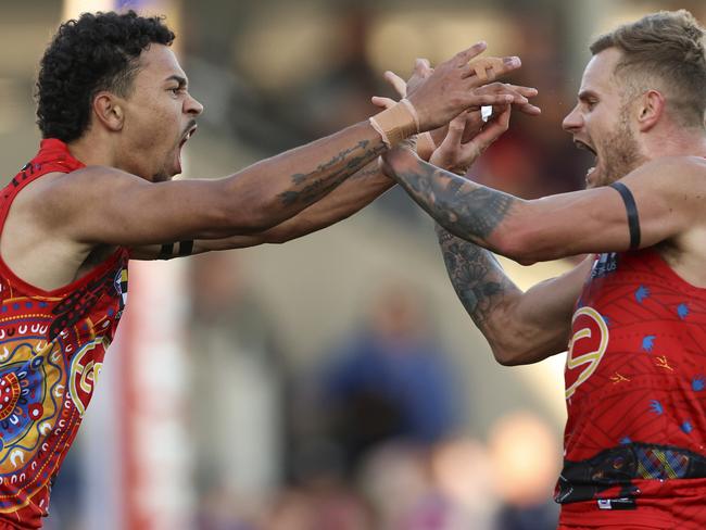 Malcolm Rosas Jr celebrates a goal with Brandon Ellis in round 10 in Ballarat. Picture: Martin Keep/Getty Images.