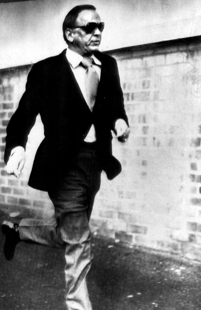 July 1974: Frank Sinatra flees journalists outside Festival Hall. Picture: News Limited