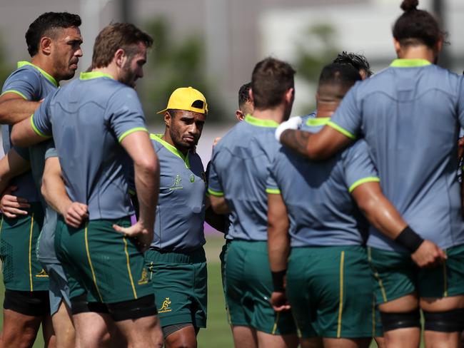 Will Genia looks on from the huddle during the Wallabies’ captain's run.