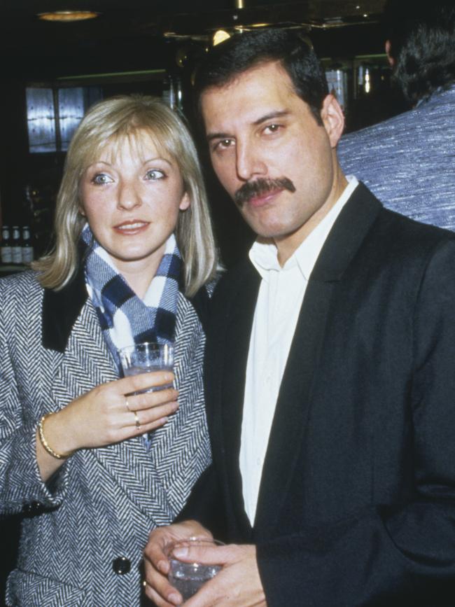 Freddie Mercury with Mary Austin in 1985. Picture: Dave Hogan