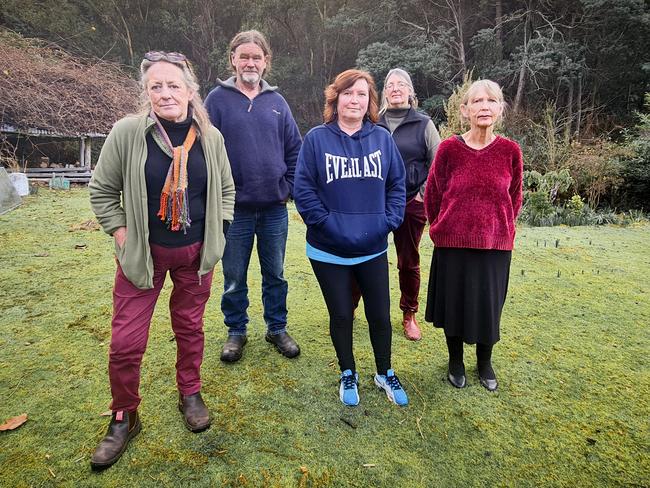 Huon Valley residents (from left) Beth Gregory, Andrew Hogarth, Jane Theile and Jo Bateman. Irene Rallings, daughter of missing man Geoffrey Rallings (centre). Picture: Amber Wilson