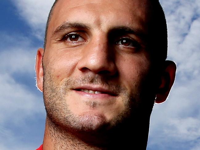 Robbie Farah in his Liverpool jersey after talking about his love for the team . A Liverpool legends team is headed out here in January 2016 .Picture Gregg Porteous