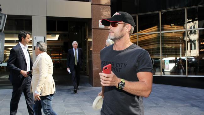 Craig McLachlan (R) and his partner Vanessa Scammell (L) pictured leaving restaurant Balcon by Tapavino in Sydney on the Monday 12th of March 2018.Picture: Christian Gilles