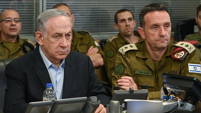 Israeli Prime Minister Benjamin Netanyahu (L), with Chief of the General Staff of the Israel Defence Forces Herzi Halevi (R).