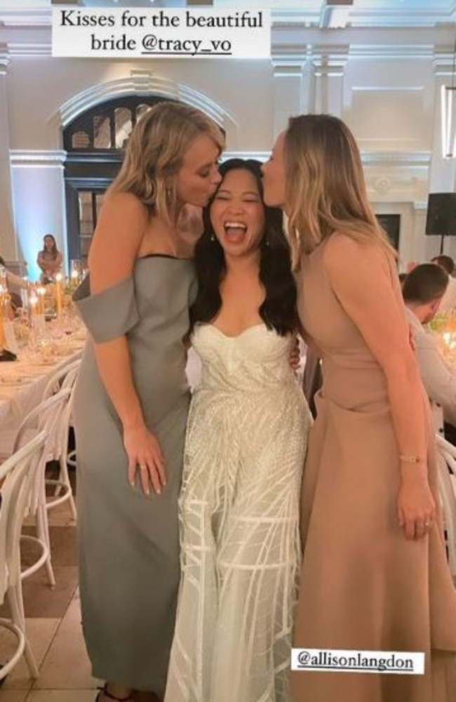 Sylvia Jeffreys and Allison Langdon kiss the bride.