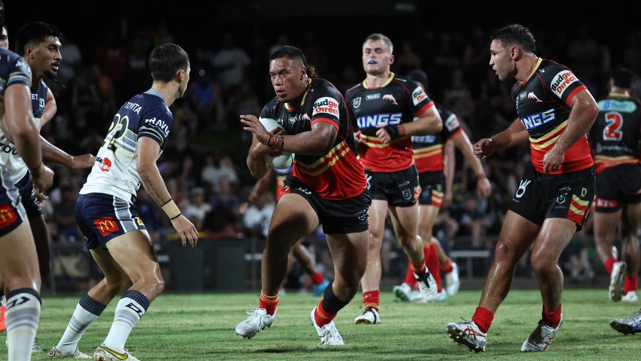 Dolphins' Elijah Rasmussen runs deep into the Cowboys defensive line in the National Rugby League (NRL) pre season NRL match between the North Queensland Cowboys and the Dolphins, held at Barlow Park. Picture: Brendan Radke