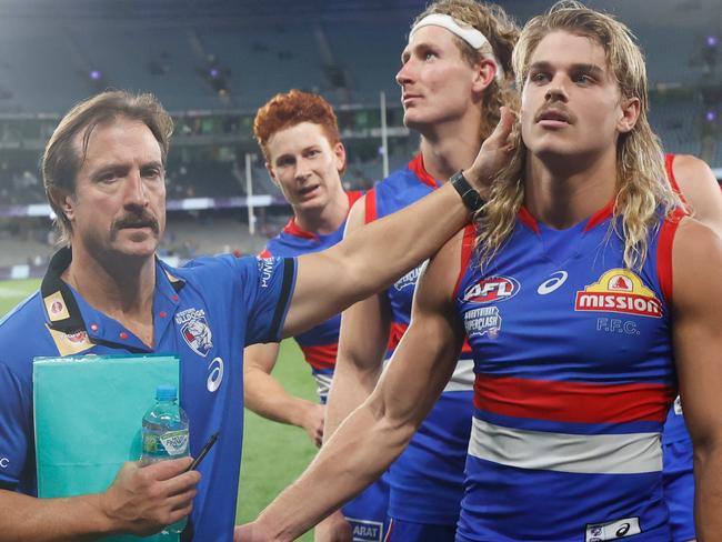 MELBOURNE, AUSTRALIA - APRIL 15: Luke Beveridge, Senior Coach of the Bulldogs and Bailey Smith of the Bulldogs celebrate during the 2022 AFL Round 05 match between the North Melbourne Kangaroos and the Western Bulldogs at Marvel Stadium on April 15, 2022 In Melbourne, Australia. (Photo by Michael Willson/AFL Photos via Getty Images)