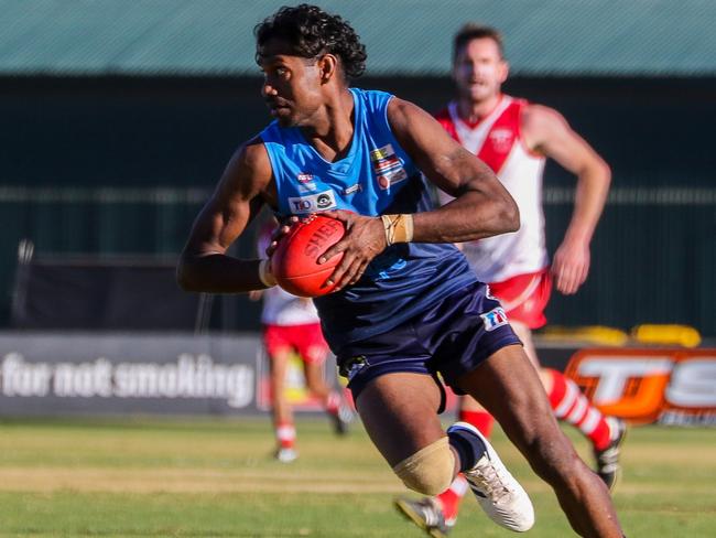 Rovers' Tosh Kunoth sets his sights on the goals on the way to booting six against Federal on Saturday. Picture: Charlie Rowson